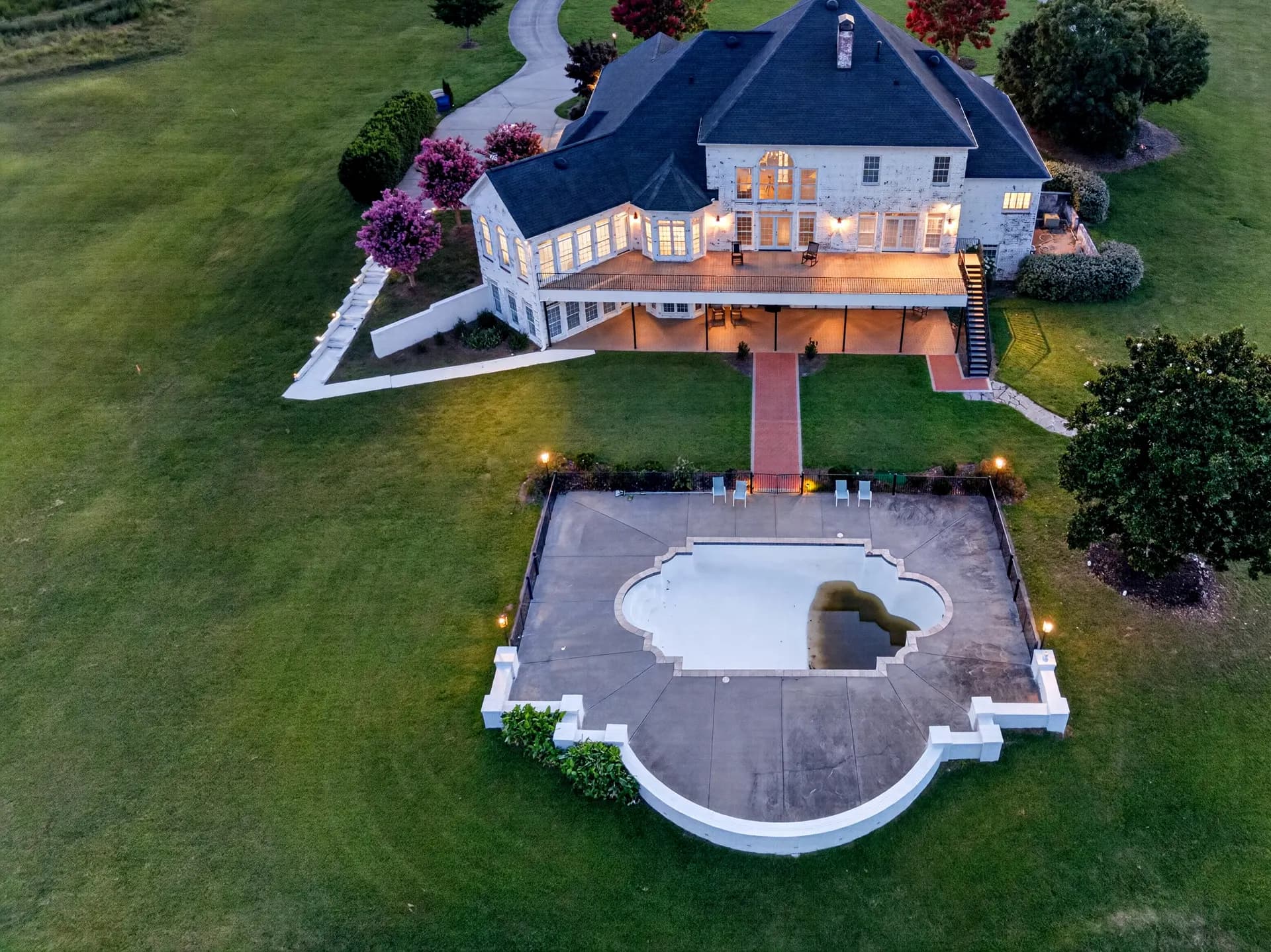 Aerial house pool twilight at White Fallow Estate