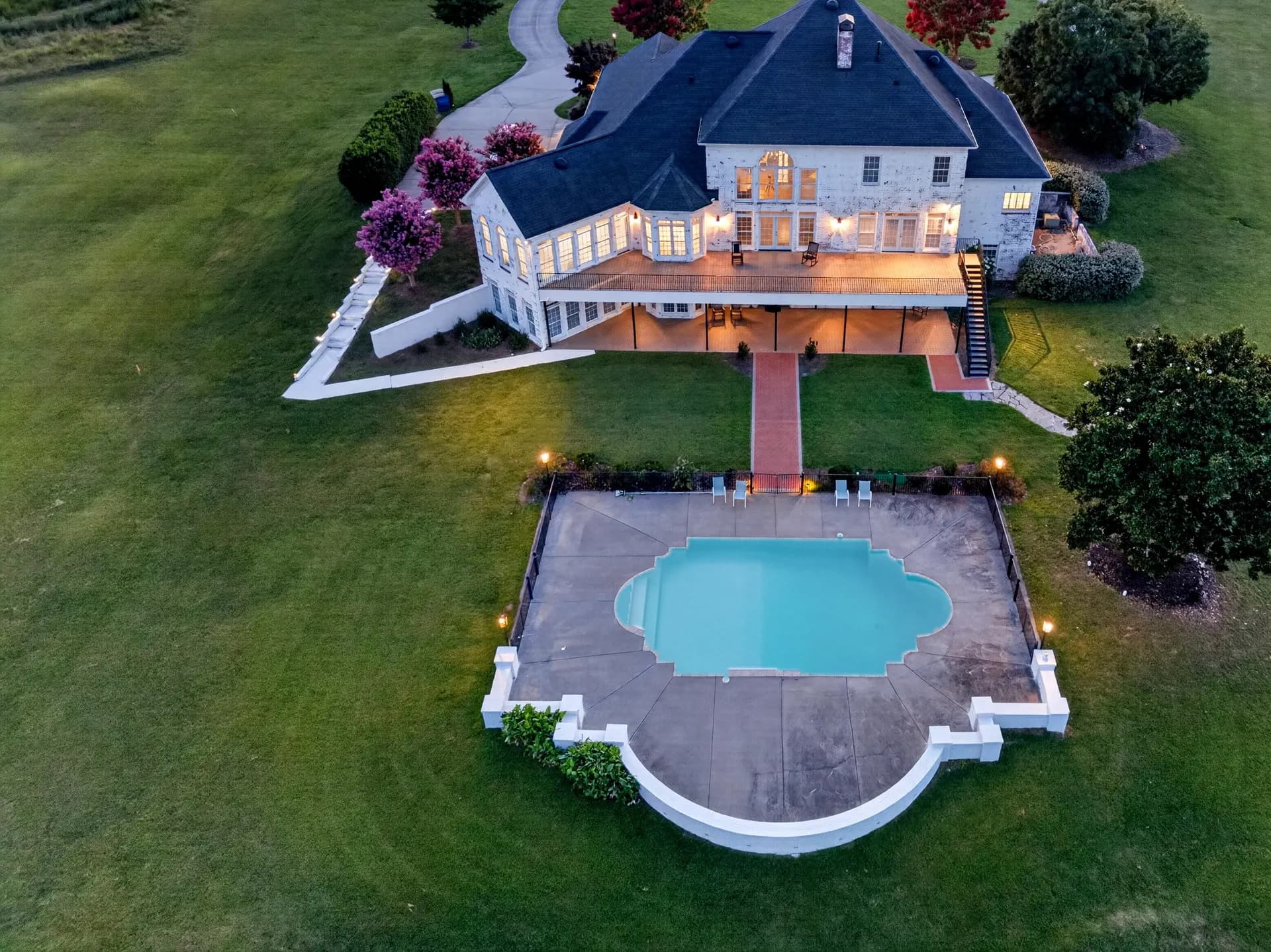 Aerial house pool twilight at White Fallow Estate