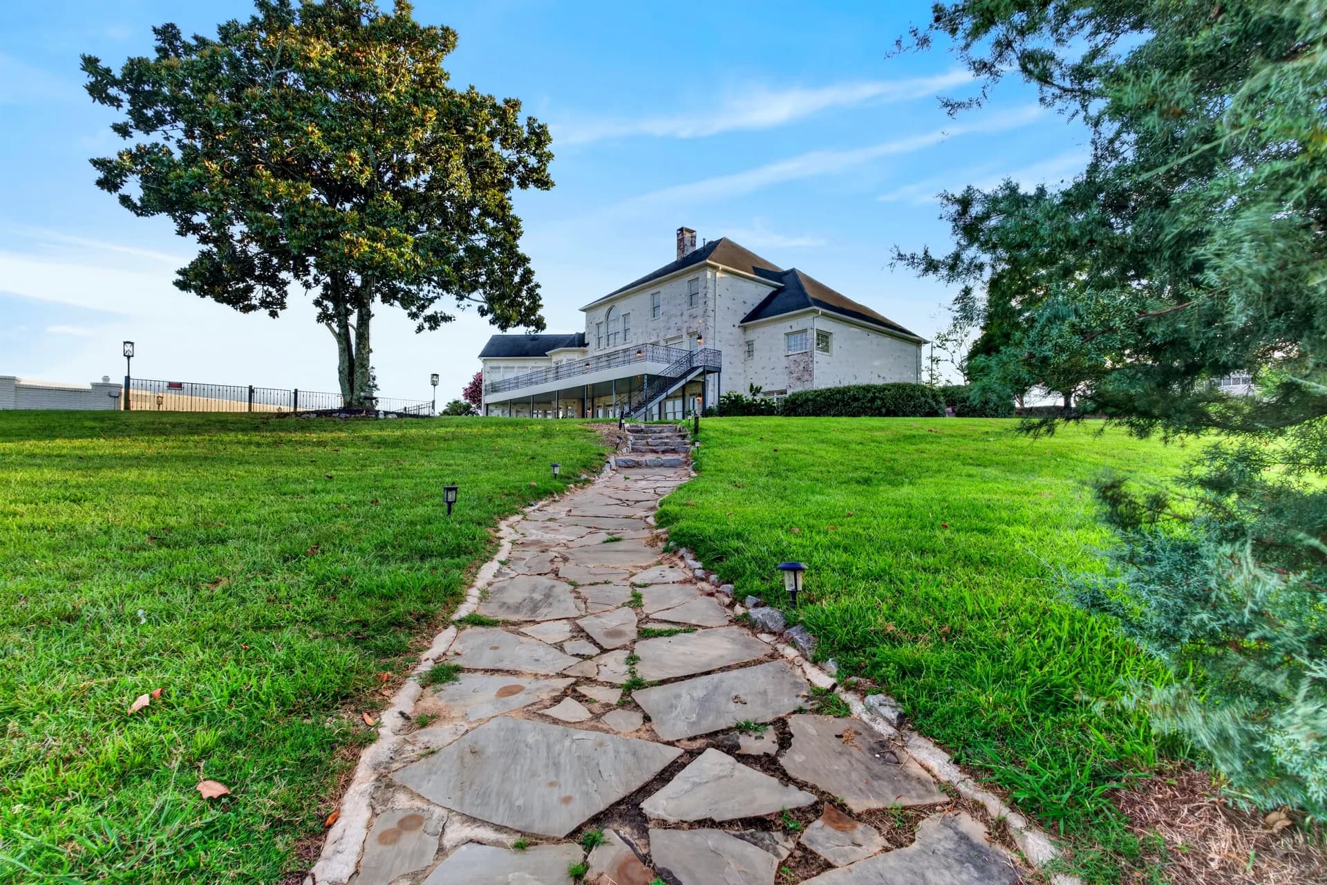 Backyard stone path at White Fallow Estate